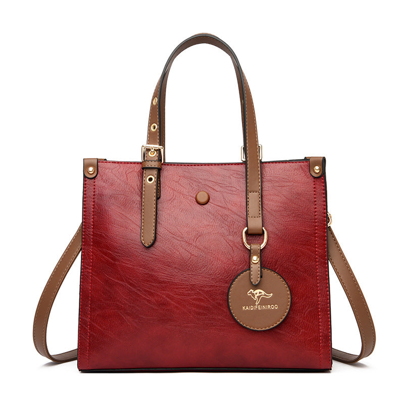 Sac de voyage élégant en cuir de vachette ciré à l'huile pour femme
