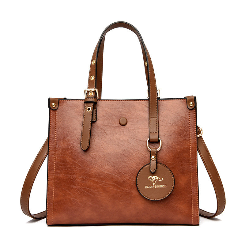 Sac de voyage élégant en cuir de vachette ciré à l'huile pour femme