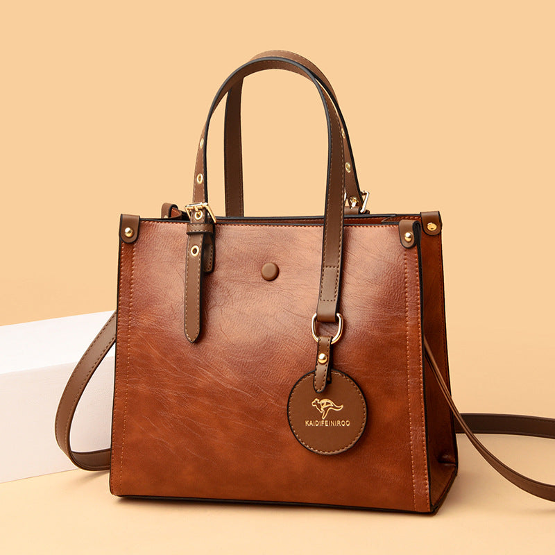 Sac de voyage élégant en cuir de vachette ciré à l'huile pour femme