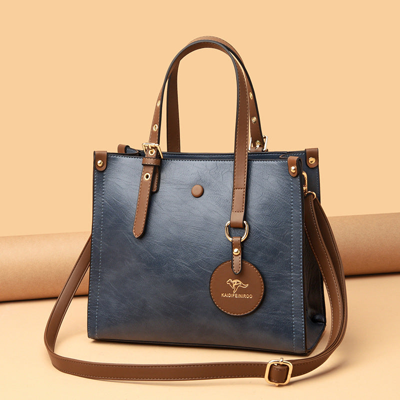 Sac de voyage élégant en cuir de vachette ciré à l'huile pour femme