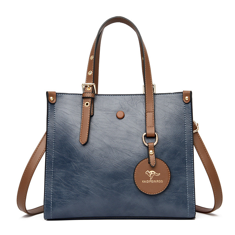 Sac de voyage élégant en cuir de vachette ciré à l'huile pour femme