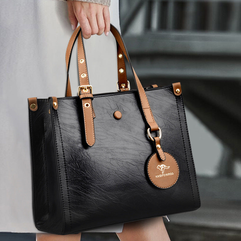 Sac de voyage élégant en cuir de vachette ciré à l'huile pour femme
