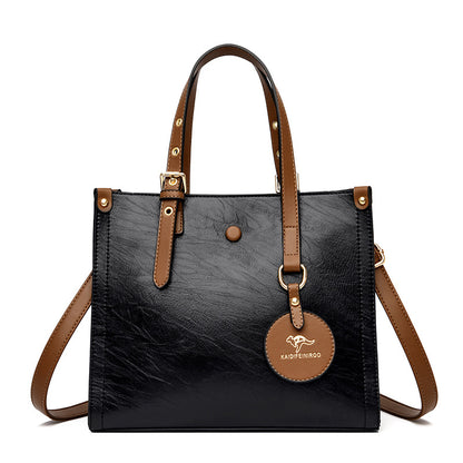Sac de voyage élégant en cuir de vachette ciré à l'huile pour femme